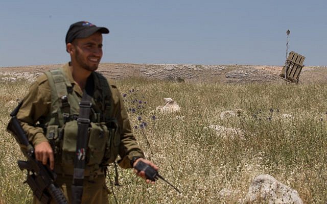 A soldier guarding an Iron Dome battery in the north of the country, May, 2013. (photo credit: Flash90) A soldier guarding an Iron Dome battery in the north of the country, May, 2013. (photo credit: Flash90)
