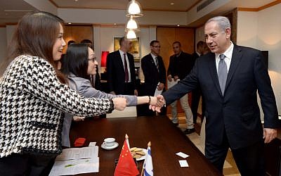Illustrative: Former Israeli prime minister Benjamin Netanyahu gives an interview to a Chinese newspaper in Shanghai, May 7, 2013. (photo credit: Avi Ohayon/GPO/Flash90)