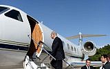 Prime Minister Benjamin Netanyahu boards a plane to Russia, Tuesday, May 14, 2013 (photo credit: Kobi Gideon/GPO/Flash90)