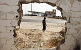 Hamas security forces stand guard at the closed gate of the Rafah crossing with Egypt in the southern Gaza Strip on May 17, 2013. (Photo credit: Abed Rahim Khatib/Flash90)