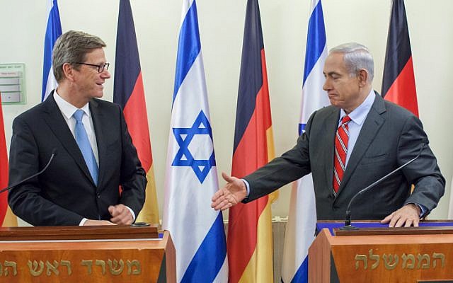 Prime Minister Benjamin Netanyahu extends his hand to German Foreign Minister Guido Westerwelle during a press conference after a meeting in Jerusalem, Friday, 17 May (photo credit: Emil Salman/Flash90) Prime Minister Benjamin Netanyahu extends his hand to German Foreign Minister Guido Westerwelle during a press conference after a meeting in Jerusalem, Friday, 17 May (photo credit: Emil Salman/Flash90)