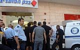 Security and rescue forces at the site of the Beersheba bank shooting, May 20 (photo credit: Greenspan/Flash90)