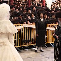 Tens of thousands of Ultra-Orthodox Jews from the Belz Hassidic dynasty attend the wedding ceremony of Rabbi Shalom Rokach, the grandson of the Belz Rabbi, to Hana Batya Pener on May 22, 2013. (Photo credit: Yaakov Naumi/Flash90)