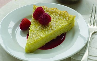 Ricotta Flan with Raspberry Sauce is a lighter alternative to the traditional Shavuot cheesecake. (photo credit: From 'Helen Nash's New Kosher Cuisine'/JTA)