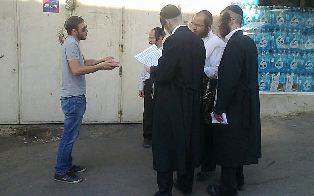 Illustrative: Anarchists and ultra-Orthodox men conversing in Jerusalem (photo credit: courtesy of Behadrei Haredim) Illustrative: Anarchists and ultra-Orthodox men conversing in Jerusalem (photo credit: courtesy of Behadrei Haredim)