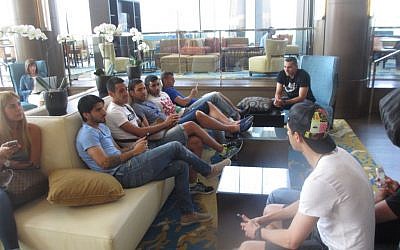 Israeli soccer players lounging at their hotel in New Jersey ahead of a match against Honduras. (photo credit: Howard Blas/Times of Israel staff)