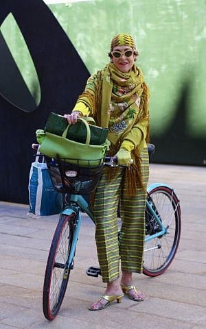 Tziporah Salamon tooling around on her bike -- without a  fashion faux pas helmet. (Courtesy of Ari Seth Cohen, advancedstyle.blogspot.com)
