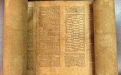 Mauro Perani, a professor of Hebrew in the university's cultural heritage department, was updating the library's Hebrew manuscript catalogue when he stumbled upon the scroll in February. (photo credit: AP Photo/Alma Mater Studiorum Universita' di Bologna)