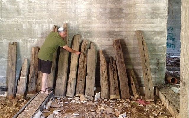 Some of the Al-Aqsa beams were brought to the settlement of Ofra in the 1980s. Pictured: Ze'ev Erlich, who helped truck the ancient wooden pieces from a junkyard north of Jerusalem (photo credit: Matti Friedman/Times of Israel)