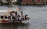 Egyptians enjoy a boat ride along the Nile River, in Cairo, Egypt, Tuesday, May 28, 2013. (Photo credit: AP/Hassan Ammar)