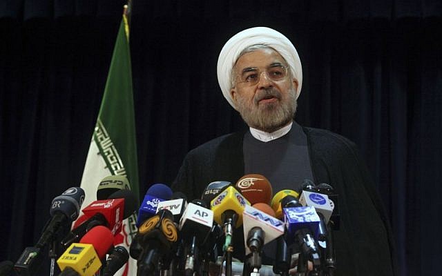 Former Iranian nuclear negotiator Hasan Rowhani speaks with media after registering his candidacy for upcoming presidential election (photo credit: AP Photo/Ebrahim Noroozi) Former Iranian nuclear negotiator Hasan Rowhani speaks with media after registering his candidacy for upcoming presidential election (photo credit: AP Photo/Ebrahim Noroozi)