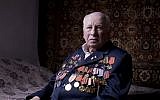 Soviet Jewish World War II veteran Matvey Gershman, 90, poses for a portrait at his house in the southern Israeli city of Ashkelon. Friday, April 12, 2013, (photo credit: AP/Oded Balilty)