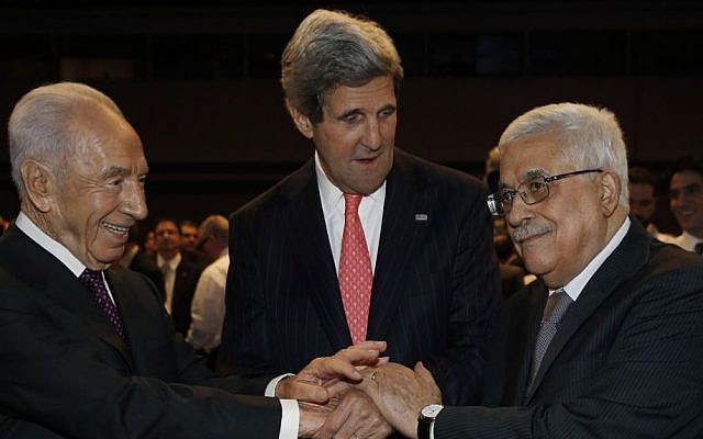 US Secretary of State John Kerry (center), Israeli President Shimon Peres (left), and Palestinian Authority President Mahmoud Abbas shake hands during the World Economic Forum in Jordan, Sunday May 26, 2013. (photo credit: AP/Jim Young) US Secretary of State John Kerry (center), Israeli President Shimon Peres (left), and Palestinian Authority President Mahmoud Abbas shake hands during the World Economic Forum in Jordan, Sunday May 26, 2013. (photo credit: AP/Jim Young)