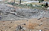 This photo released by the Syrian official news agency SANA, shows a general view of damaged buildings wrecked by an Israeli airstrike, in Damascus, Syria, Sunday, May 5, 2013. (Photo credit: AP/SANA)