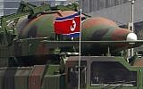 In this Sunday, April 15, 2012 file photo, what appears to be a new missile is carried during a mass military parade at the Kim Il Sung Square in Pyongyang, North Korea, to celebrate the 100th anniversary of the country's founding father Kim Il Sung. (photo credit: AP/Ng Han Guan, File)