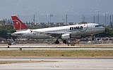 Northwest Airlines A320 upon takeoff in San Jose, California, 2007. (photo credit: Dylan Ashe, CC, via wikipedia)