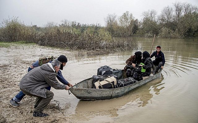 Rebel troops transporting two women to safety along the Orontes River, which has shrunk in recent years and grown increasingly saline (Photo credit: CC BY FreedomHouse)