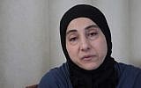 Zubeidat Tsarnaeva, mother of the Boston Marathon bombings suspects, speaks to reporters in Makhachkala, the regional capital of Dagestan, Russia, on Thursday (photo credit: AP/Musa Sadulayev)