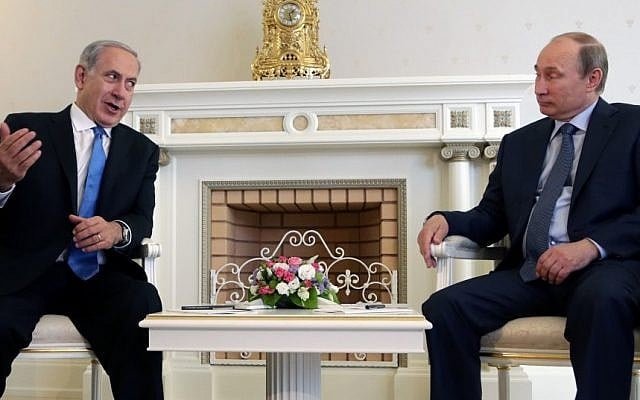 Russian President Vladimir Putin, right, listens to Israeli Prime Minister Benjamin Netanyahu during their meeting at the Bocharov Ruchei residence in the Black Sea resort of Sochi, Russia, Tuesday, May 14, 2013. (photo credit: AP/ Maxim Shipenkov) Russian President Vladimir Putin, right, listens to Israeli Prime Minister Benjamin Netanyahu during their meeting at the Bocharov Ruchei residence in the Black Sea resort of Sochi, Russia, Tuesday, May 14, 2013. (photo credit: AP/ Maxim Shipenkov)