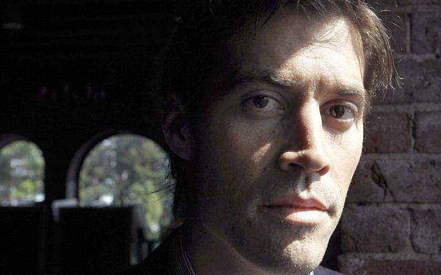 In this May 27, 2011, file photo, American journalist James Foley of Rochester, NH, poses for a photo in Boston. (photo credit: AP/Steven Senne) In this May 27, 2011, file photo, American journalist James Foley of Rochester, NH, poses for a photo in Boston. (photo credit: AP/Steven Senne)
