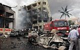 The site of one of several explosions that killed at least 50 people and injured dozens near Turkey's border with Syria, Saturday, May 11, 2013. Protesters on Wednesday accused the Turkish government of putting the country at risk by openly supporting Syria's armed insurgency.  (photo credit: AP/IHA)