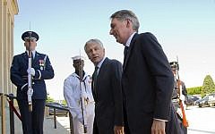US Defense Secretary Chuck Hagel escorts British Defense Secretary Philip Hammond into the Pentagon, Thursday, May 2. (photo credit: AP/J. Scott Applewhite)