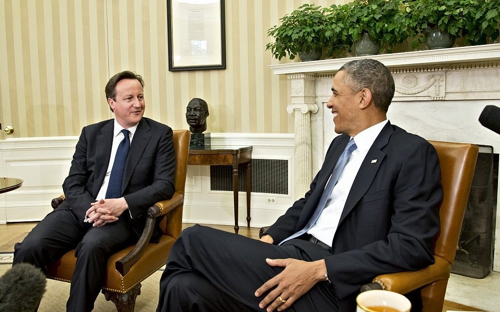 US President Barack Obama welcomes British Prime Minister David Cameron in the Oval Office in May 2013. (photo credit: AP/J. Scott Applewhite) US President Barack Obama welcomes British Prime Minister David Cameron in the Oval Office in May 2013. (photo credit: AP/J. Scott Applewhite)
