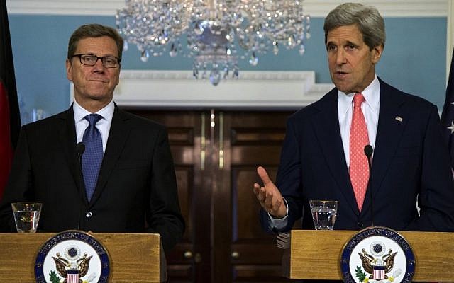 Secretary of State John Kerry, right, gestures as he speaks during a news conference with German Foreign Minister Guido Westerwelle at the State Department in Washington, Friday, May 31, 2013. (photo credit: AP/Evan Vucci) Secretary of State John Kerry, right, gestures as he speaks during a news conference with German Foreign Minister Guido Westerwelle at the State Department in Washington, Friday, May 31, 2013. (photo credit: AP/Evan Vucci)
