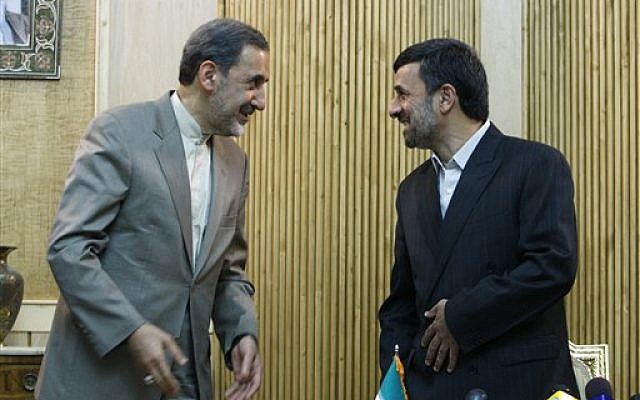 Iranian presidential hopeful, Ali Akbar Velayati, adviser to the Iranian supreme leader Ayatollah Ali Khamenei, left, talks with President Mahmoud Ahmadinejad, (photo credit: AP Photo/Vahid Salemi) Iranian presidential hopeful, Ali Akbar Velayati, adviser to the Iranian supreme leader Ayatollah Ali Khamenei, left, talks with President Mahmoud Ahmadinejad, (photo credit: AP Photo/Vahid Salemi)