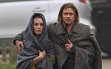 Danielle Kertesz with Brad Pitt in "World War Z" (photo credit: Courtesy)