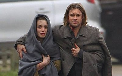 Danielle Kertesz with Brad Pitt in "World War Z" (photo credit: Courtesy)