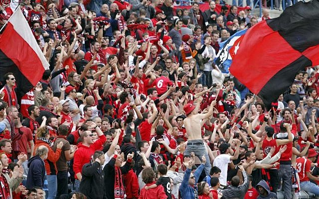 Passionate Hapoel Katamon Jerusalem fans at a game earlier this season (photo credit: Guy Yitzhaki, Hapoel Katamon Jerusalem's website; katamon.co.il)
