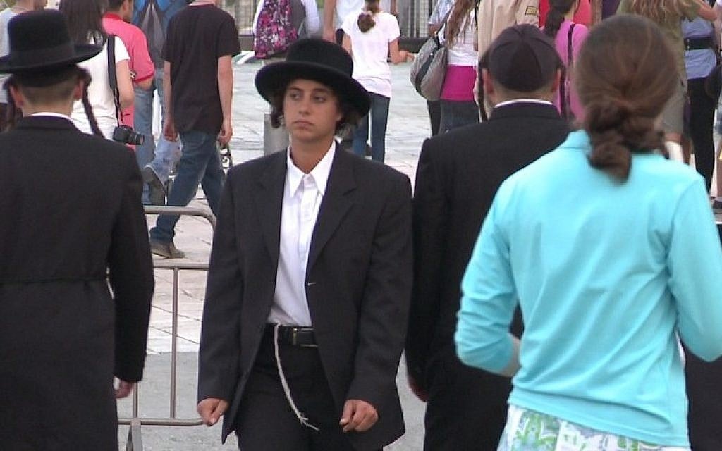 Filmmaker Jessie Kahnweiler tries a Hasidic man's suit on for size in her new web series, 'Dude, Where's My Chutzpah?' (photo credit: courtesy of Jessie Kahnweiler) Filmmaker Jessie Kahnweiler tries a Hasidic man's suit on for size in her new web series, 'Dude, Where's My Chutzpah?' (photo credit: courtesy of Jessie Kahnweiler)