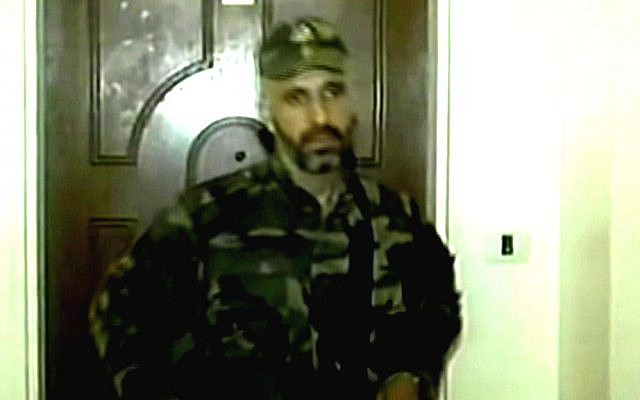 Ayman Sharawneh in Hamas fatigues months after Israel released him to Gaza (photo credit: Channel 2 screen capture) Ayman Sharawneh in Hamas fatigues months after Israel released him to Gaza (photo credit: Channel 2 screen capture)