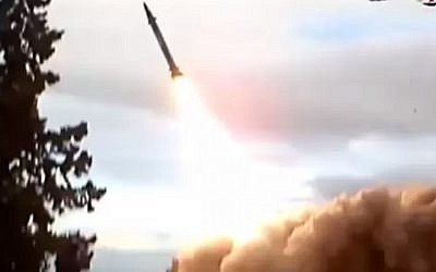 A shot from a video purporting to show a Tishreen missile being test fired. (Screenshot/YouTube)