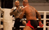 Atilla Petrovszki (left) sporting his anti-Semitic tattoos in a mixed martial arts fight. (photo credit: image capture from YouTube)