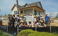 Students from University of California, Santa Cruz Hillel and Hillel of San Diego in Birmingham, AL helping out with JDRC. (photo credit: Courtesy of JDRC)