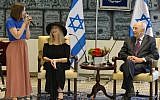 Shimon Peres and Barba Streisand with a girl from the Make-A-Wish Foundation at the President's Residence Monday. (photo credit: Mark Neyman/GPO)