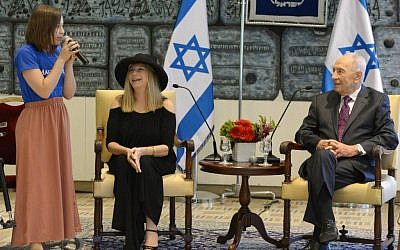 Shimon Peres and Barba Streisand with a girl from the Make-A-Wish Foundation at the President's Residence Monday. (photo credit: Mark Neyman/GPO)