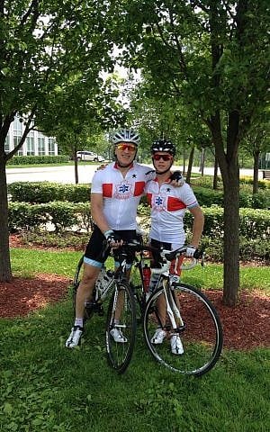 Allan (left) and Jedediah Kliger in their Maccabi Canada cycling outfit (photo credit: Courtesy)