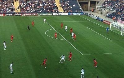 Israel (in white) attack the English goal, Tuesday. (photo credit: Aaron Kalman/Times of Israel)