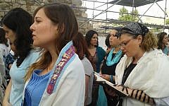 Women of the Wall pray with phylacteries and prayer shawls Sunday morning (photo credit: Ricky Ben-David/Times of Israel)