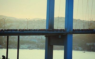 Protesters cross the Bosphorus Strait en masse as they make their way from Taksim Square to Kadikoy to protest the Turkish government's intolerance toward demonstrations, Friday. (photo credit: Facebook)