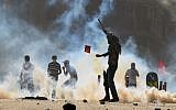 Riot police clashing with protesters in Istanbul on Saturday (photo credit: AP)