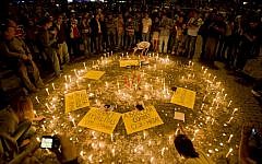 Turks light candles for the victims of the protests at Taksim square, in Istanbul, early Saturday, June 15, 2013. (AP Photo/Vadim Ghirda)