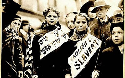 "ABOLISH CHILD SLAVERY!!" in English and Yiddish, probably taken during May 1, 1909 labor parade in New York City. Jewish American women have often been at the forefront of social change. (Photo credit: George Grantham Bain Collection, Library of Congress).