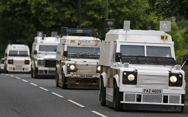 Police trucks patrol the streets around the G8 summit venue in Enniskillen, Northern Ireland on Sunday, June 16 (photo credit: AP/Lefteris Pitarakis) Police trucks patrol the streets around the G8 summit venue in Enniskillen, Northern Ireland on Sunday, June 16 (photo credit: AP/Lefteris Pitarakis)