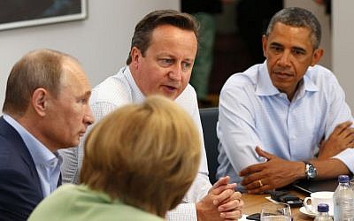 G8 leaders from left, German Chancellor Angela Merkel, Russian President Vladimir Putin, Britain's Prime Minister David Cameron and US President Barack Obama attend a working session during the G-8 summit in Enniskillen, Northern Ireland on Tuesday, June 18, 2013. (Photo credit: AP/Yves Herman, Pool)