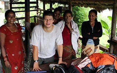 Chanan Cassel meets local Nepali people on his 2011 backpacking trip (photo credit: courtesy Enosh Cassel)