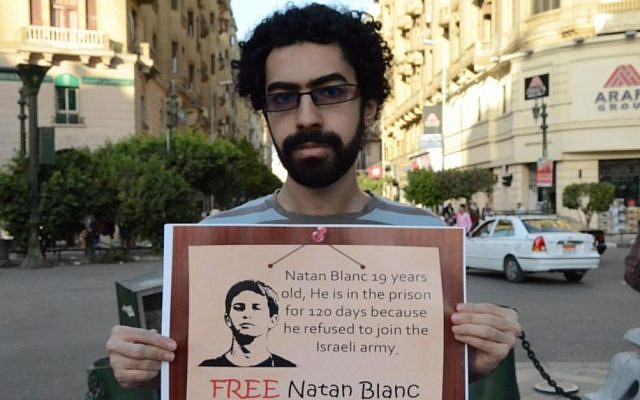 Egyptian pacifist Emad Al-Dafrawi poses with a sign in support of Nathan Blanc, Cairo, April 19 (photo credit: courtesy/Nader Wagdy) Egyptian pacifist Emad Al-Dafrawi poses with a sign in support of Nathan Blanc, Cairo, April 19 (photo credit: courtesy/Nader Wagdy)